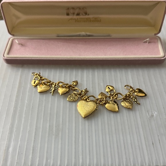 1928 for things Remembered Jewelry - 1928 things for Remembered Gold Tone Charms, hearts, cherubs & Locket Bracelet